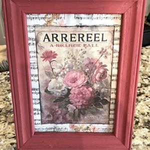 Framed floral picture.